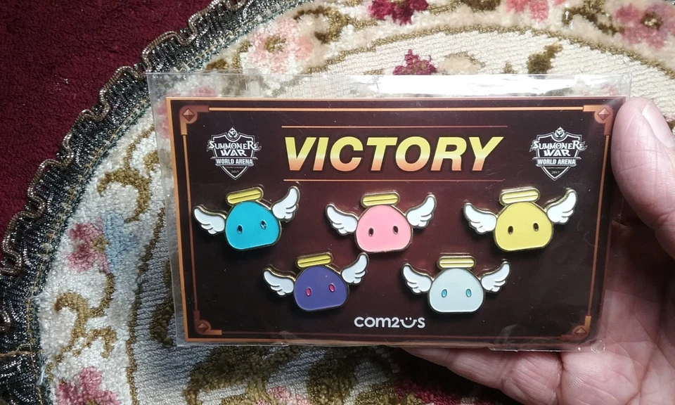 Com2uS Summoners War World Arena Championship 2017 Angelmon Victory Pinback Set - Image 1 of 4