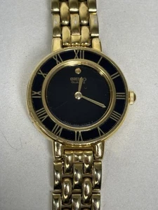 Seiko Watch Women 21mm Black Dial Gold Tone Round 1N00-0D29 New Battery - Picture 1 of 4
