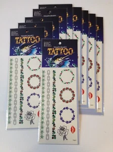 Tatuaggi temporanei senza marchio lotto di 10 pezzi ombelico fiori foglie catena labbra - Foto 1 di 7