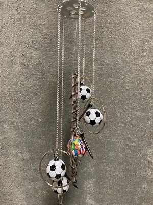 Carillón de viento para pelota de golf de fútbol Foto 1 de 4