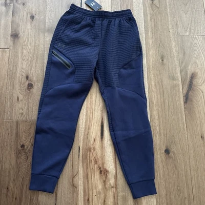 Pantalones de chándal Under Armour para hombre medianos imparables de rejilla polar azul 1386544 nuevos con etiquetas Foto 1 de 4