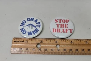 LOT OF 2 STOP THE DRAFT & NO DRAFT NO WAR 1980 BUTTONS ORIGINAL PINBACKS RARE - Picture 1 of 2