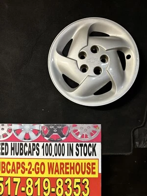 Chevrolet Cavalier 1992-99 14” tapacubos 1 original atornillado, usado bonitos defectos menores Foto 1 de 4