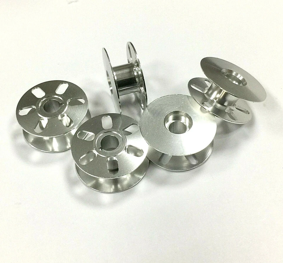 5X  Bobbins with 6 Holes 0867-150140  26mm   Durkopp Adler 767, 1767, 867 etc. - Image 1 of 1