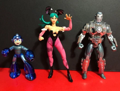 Marvel vs Capcom - War Machine, Mega Man & Morrigan - ToyBiz 1999 Cover