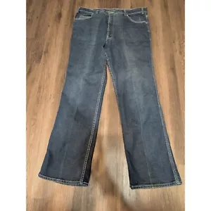 Vintage Levis Blue Tab Movin on Jeans Dark Wash Denim Jeans Size 30x32 - Picture 1 of 6