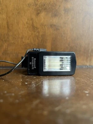 Flash de cámara vintage Honeywell Strobolite 18 con cable accesorio de cámara Foto 1 de 4