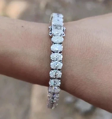 Brazalete de tenis de diamantes creado en laboratorio de corte ovalado de 20 quilates para mujer enchapado en oro blanco de 14 quilates Foto 1 de 4