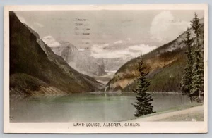 Cartolina Banff Alberta Canada Lake Louise ghiacciaio vittoriano RPPC colorata a mano - Foto 1 di 3