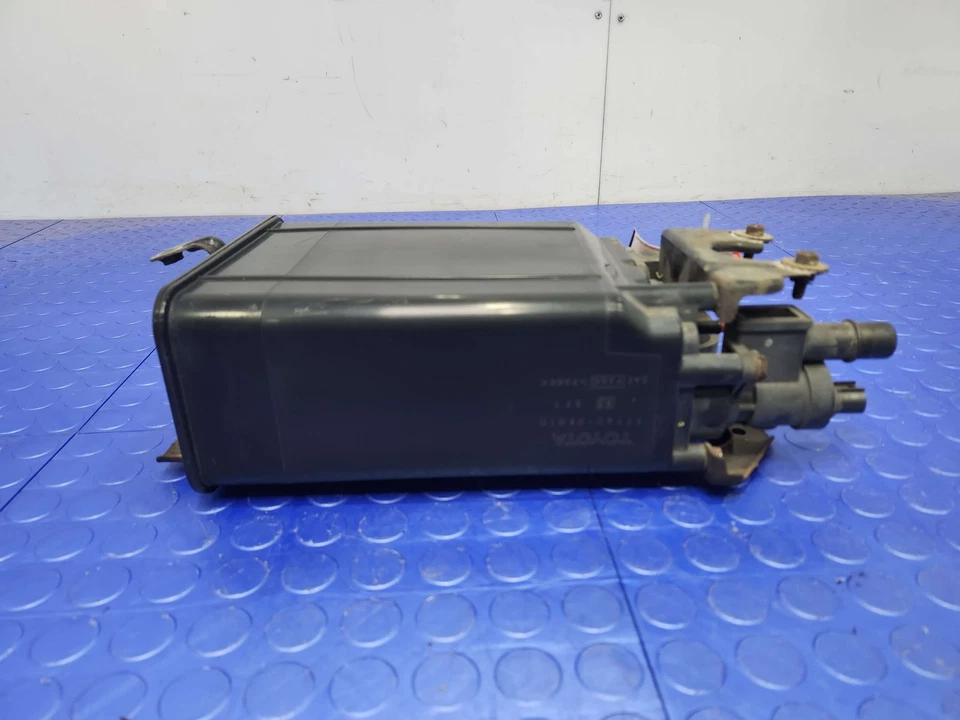 04-06 Conjunto de bote de carbón de vapor de combustible Lexus RX330 genuino OEM 777400E010 Foto 1 de 4