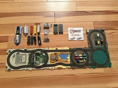 Basic Fun Inc. 2004 XTS Expandable Miniature Train Set with Track Lot - Image 1 of 4