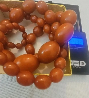 Antique Old Vintage Egg YOLK Amber Bakelite Graduated Bead Necklace 84.32 Grams - Image 1 of 4