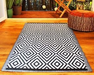 Alfombra exterior RAUTE 120x180 cm negra terraza balcón RV camping resistente a la intemperie - Imagen 1 de 3