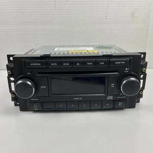 2007-2014 Chrysler Dodge Jeep Radio 6 Disc CD MP3 AUX Sirius P05064171AG OEM - Picture 1 of 7