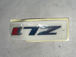 2012-2023 CAMARO CHROME/RED "ZL1" GRILLE EMBLEM NEW GM # 22830717 - Picture 1 of 5