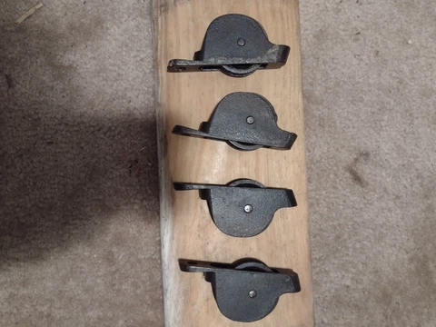 4 antique window sash pulleys Cover