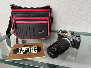 Nikon FE 35mm fotocamera con obiettivo serie E 75-150mm F3.5, manuale e custodia - Foto 1 di 14