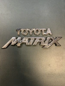 Logotipo emblema escotilla maletero Toyota Matrix 2003-13 - Imagen 1 de 11