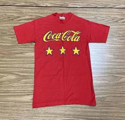 Camiseta de Colección Años 80 Coca-Cola Amarilla 3 Estrellas Hecha en EE. UU. Rara Talla XS Excelente Estado Foto 1 de 4