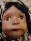 18" Porcelain Native American Doll in Swing. Unknown Maker