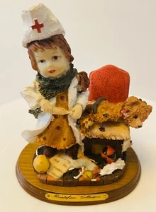 HERMOSA COLECCIÓN MONTEFIORI RARA VINTAGE - NIÑA CRUZ ROJA CON OSO- - Imagen 1 de 5