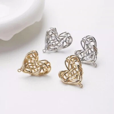 Pendientes de corazón tono oro/plata 4 piezas, aretes de corazón de amor con lazo Foto 1 de 4