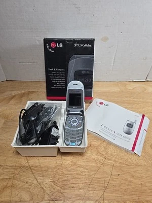 Teléfono plegable LG UX210 plateado (celular de EE. UU.) Foto 1 de 4