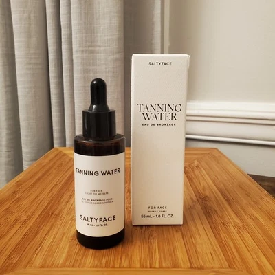 Saltyface Tanning 水 适用于面部灯至中等 1.8 盎司 55 毫升全尺寸咸脸 — 第 1/4 张图片