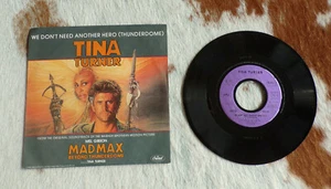 DISQUE VINYLE 45 TOUR 45T -TINA TURNER-MAD MAX-WE DON'T NEED ANOTHER HERO - Picture 1 of 1