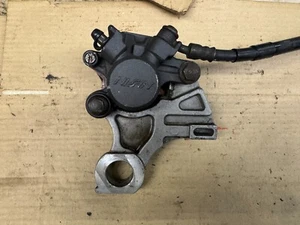 SUZUKI GSXR 1000 L1 2011 2009 -2016 REAR BRAKE CALIPER WITH BRACKET HANGER - Picture 1 of 4