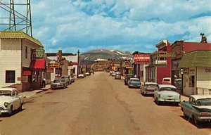 Front Street Fairplay Colorado CO Hotel Drug Store Old Cars c1960 Postcard - Picture 1 of 2