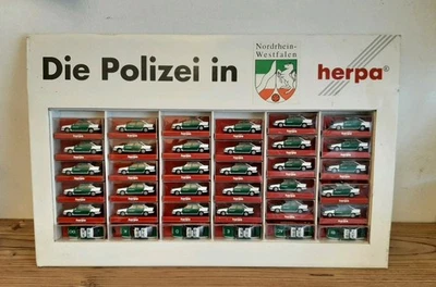 Herpa 1:87 H0 Aufsteller Polizei NRW 184397 In OVP  36 Modellautos Opel Vectra - Bild 1 von 4