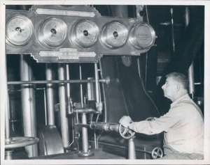 1957 Press Photo Machinist Lawrence Centola Works Controls Pumping Station MA - Picture 1 of 2
