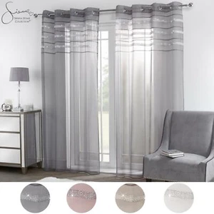 Sienna Pair of 2 Diamante Glitzy Voile Net Curtains Eyelet Ring Top Blush Grey - Picture 1 of 13