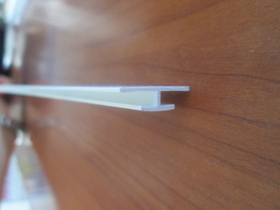 PROFILI IN PVC BIANCO RACCORDI PANNELLI H3,5 22X11 DA MT. 1 - Immagine 1 di 1