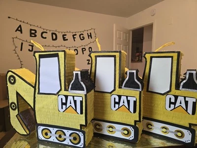 Piñata yellow cat excavator piñata - Image 1 of 2