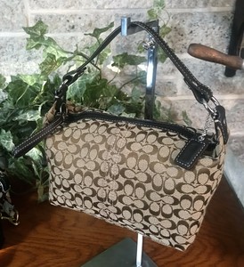 coach handle pouch signature bolsa