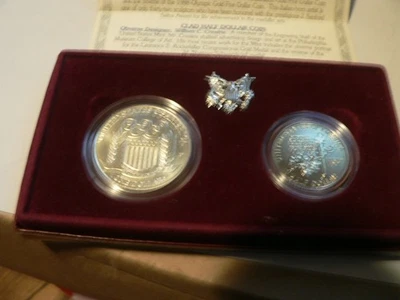 1992 Olympic Silver Dollar & Half Dollar uncirculated 2 Coin Set With Box papers - Image 1 of 2
