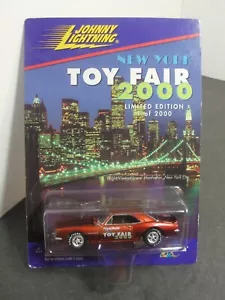 Johnny Lightning 1/64 2000 New York Toy Fair Camaro anni 80 - Foto 1 di 4