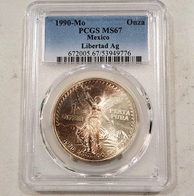 1990-Mo 1 Onza Mexico Silver Libertad ~ PCGS MS 67 ~ Crescent Toned - Image 1 of 3