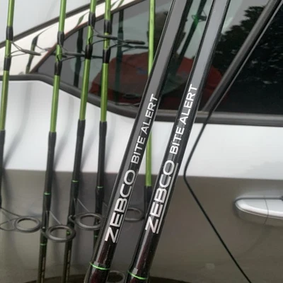 (Lote de 2) Caña de pescar giratoria Zebco Bite Alert 2 piezas 7' mediana pesada 17-50 lb. Foto 1 de 4