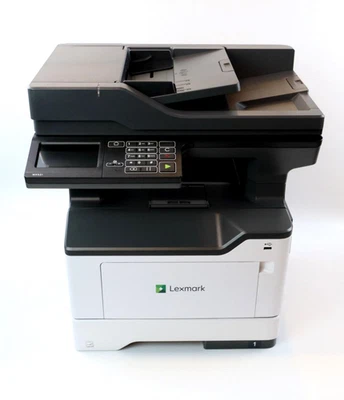 Lexmark MX521ade - S/W A4 MFP - 10.150-14.655 Seiten gedruckt - Inkl. Toner/Drum - Bild 1 von 2