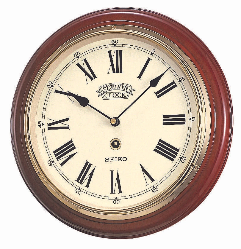 Seiko Dark Wooden Round Quartz Battery Wall Clock with Clear Face QXA143B - Image 1 of 1
