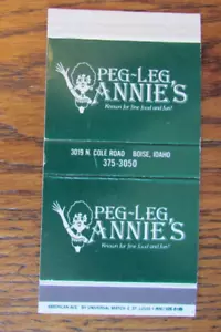 BOISE, IDAHO MATCHBOX COVER: PEG LEG ANNIE'S COVER FIAMMIFERO VUOTA -C - Foto 1 di 1