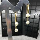 Rebecca Minkoff gold tone faux pearl jacket statement earrings. 