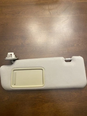 Parasol lateral izquierdo Toyota Prius 2010-2015 tela gris fabricante de equipos originales Foto 1 de 4