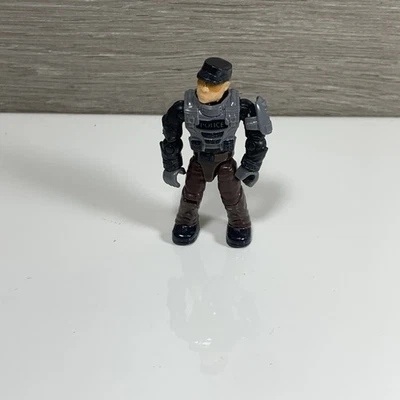 Minifigura negra de oficial MEGA BLOKS Halo NMPD 97452 Police Cruiser Standoff Foto 1 de 4