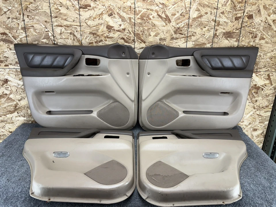 JUEGO PANELES PUERTA TOYOTA LAND CRUISER J100 1998-2002 ROBLE MARRÓN TOSTADO BEIGE OEM Foto 1 de 4