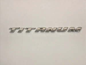2013-2018 FORD FUSION TITANUM REAR LID TRUNK EMBLEM BADGE SYMBOL LOGO OEM USED - Picture 1 of 2