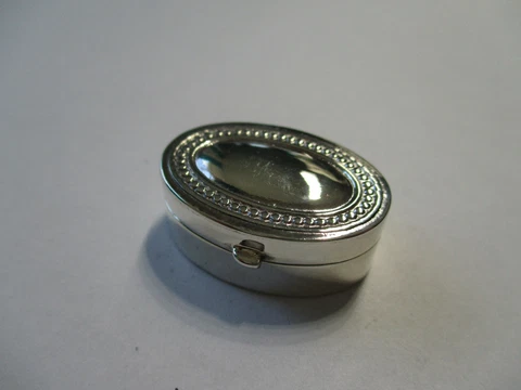 Gorgeous New style sterling silver pill box oval shape engraved  1 inch long Cover